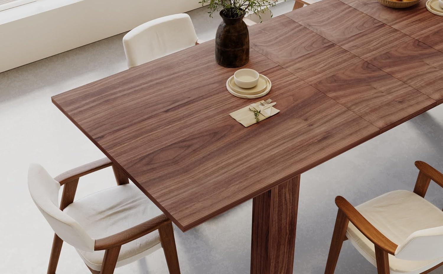 Dining table with chairs in a modern kitchen setting