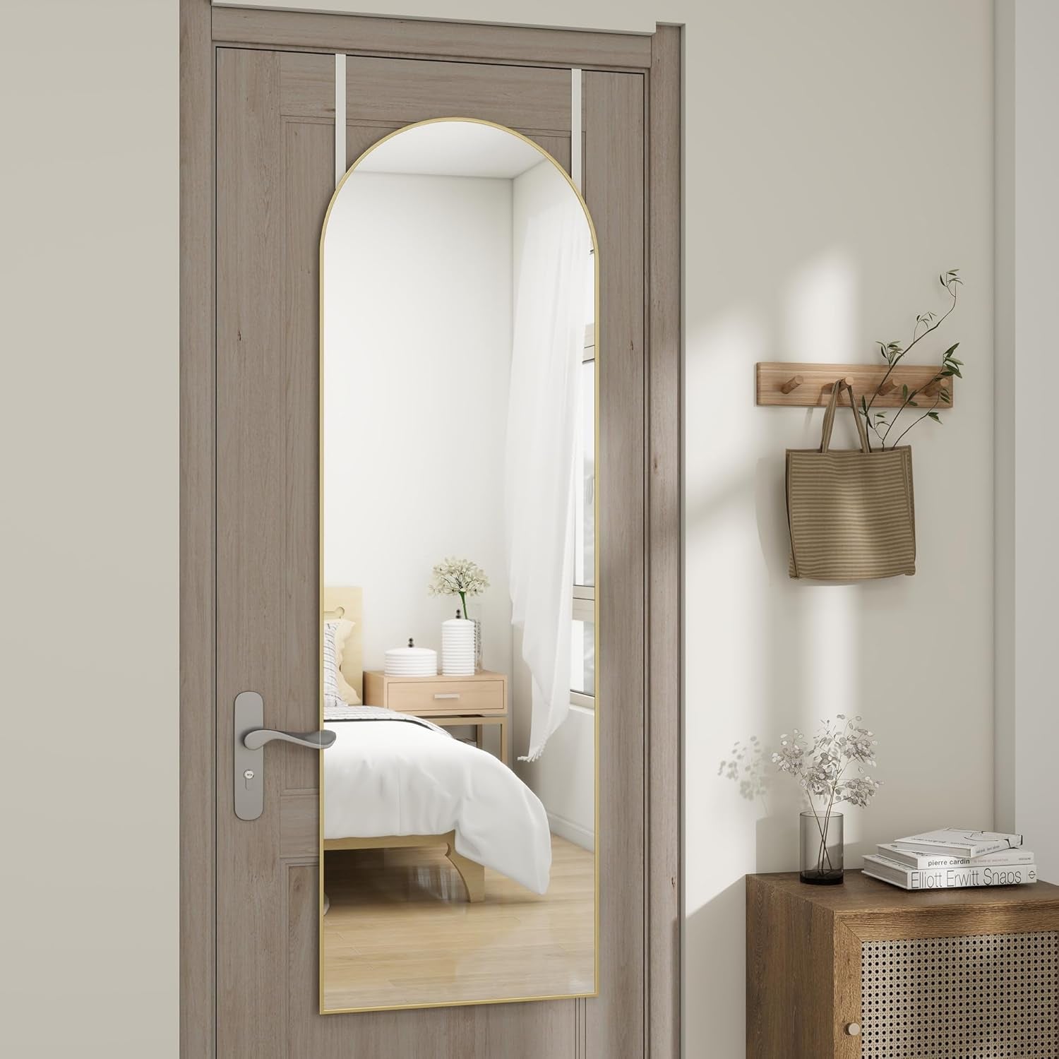 Wooden door with a full-length mirror in a room setting.