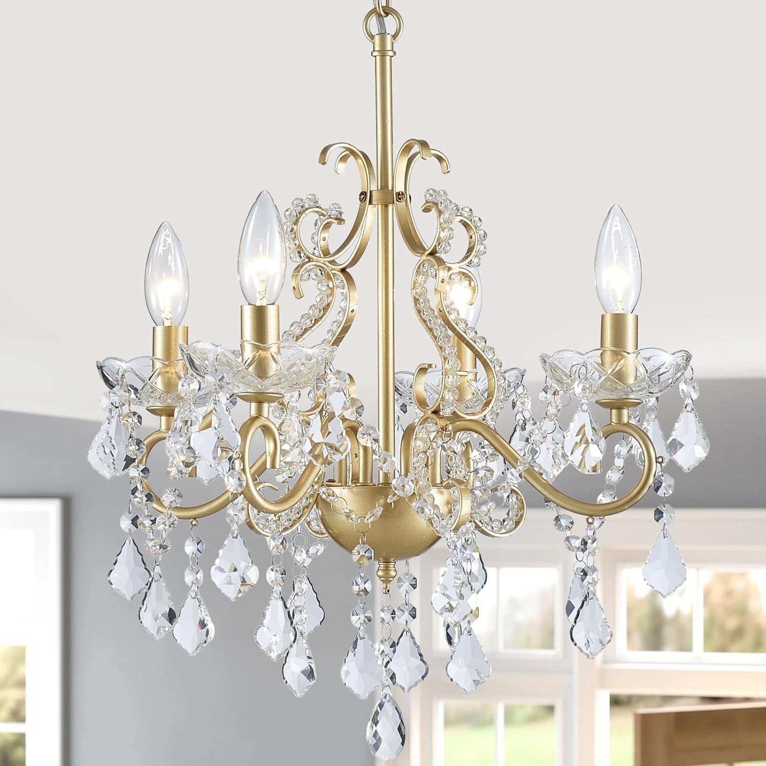 Gold chandelier with crystal accents in a room setting