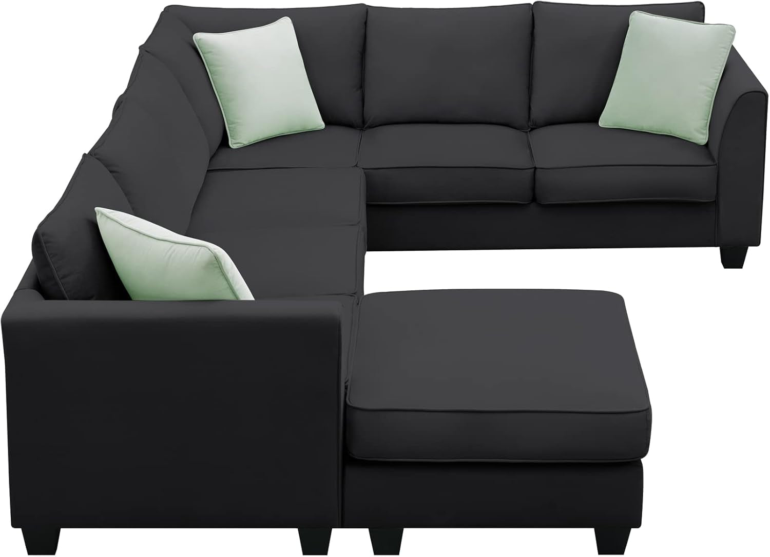 Black sectional sofa with light green cushions on a white background