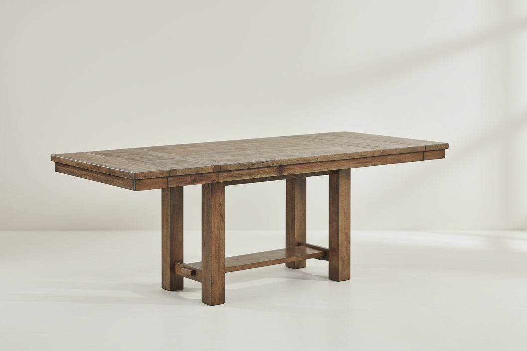 Wooden dining table on a white background