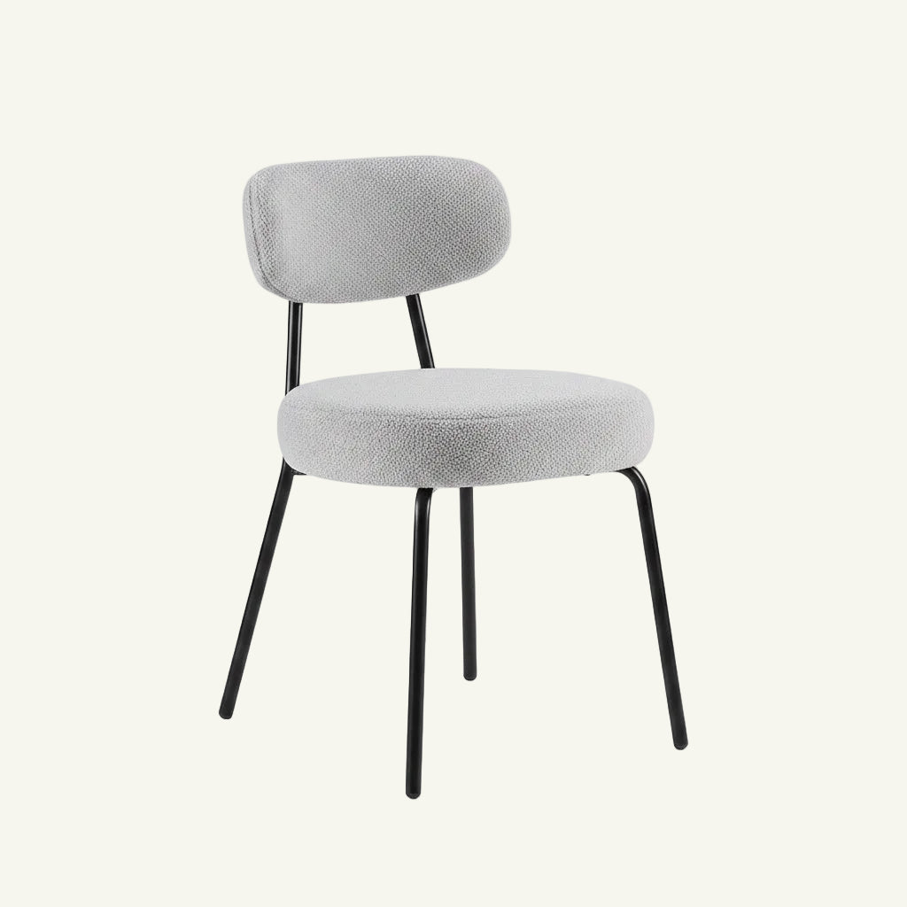 Gray cushion with ergonomic design on a chair, showing close-up and measurement details.