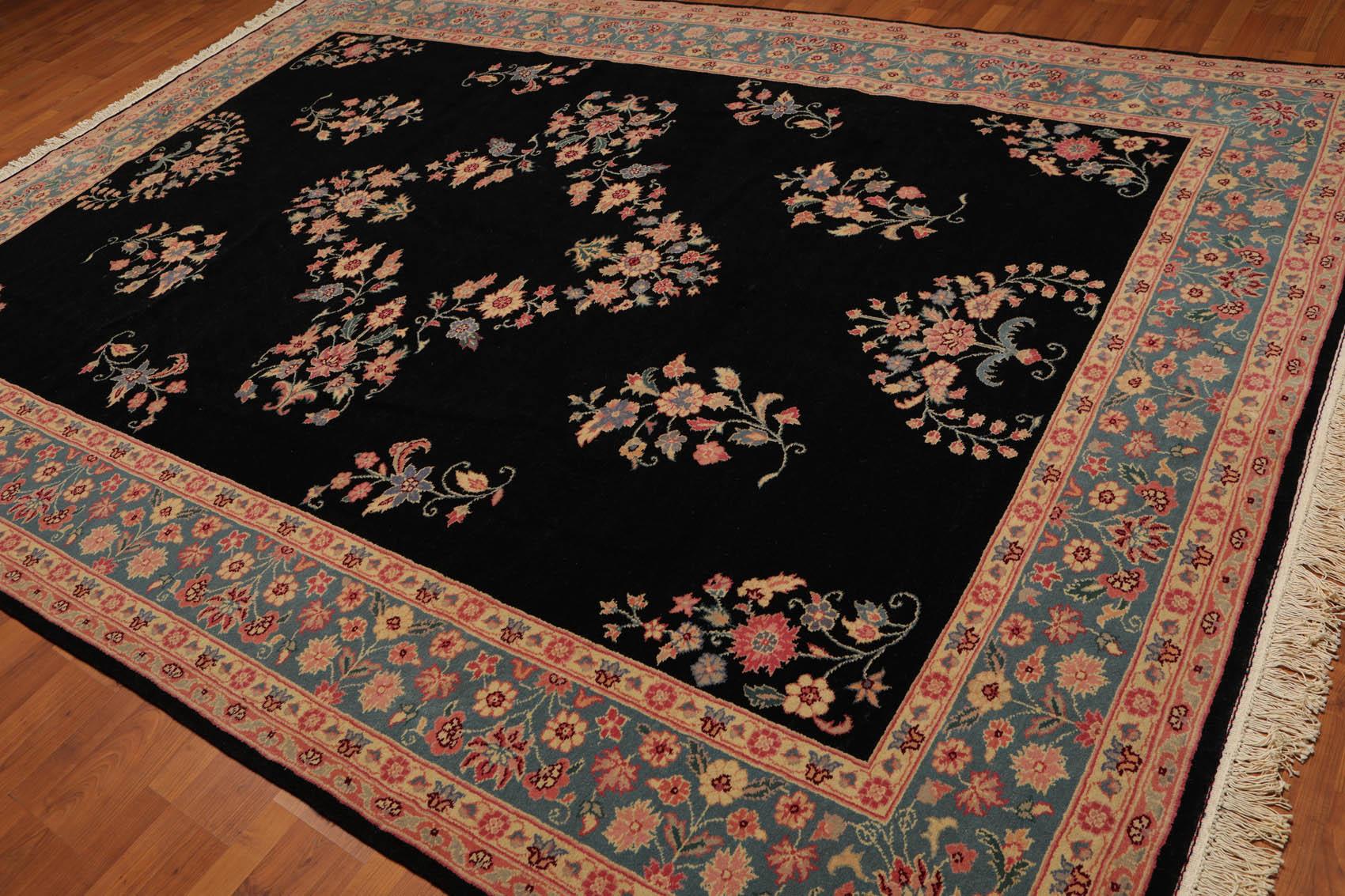 Decorative rug with floral patterns on a wooden floor