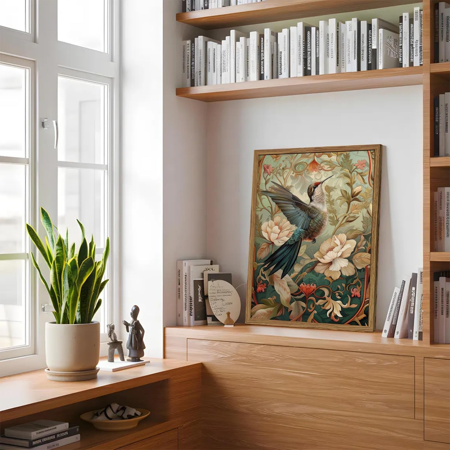 Decorative interior with a bookshelf, framed artwork, and potted plant.