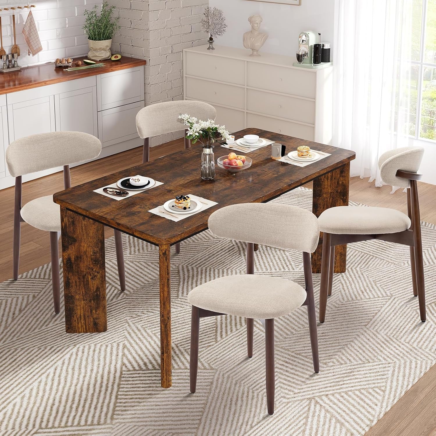Dining room with a wooden table and chairs in a well-lit room.
