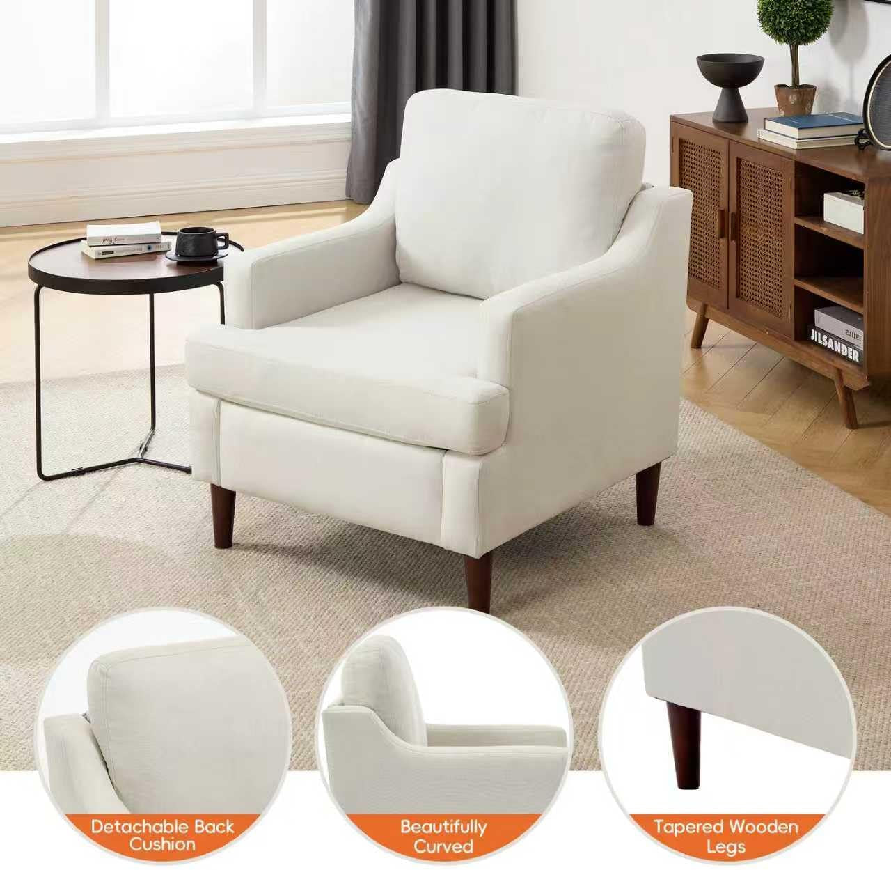 White armchair in a living room with decorative elements.