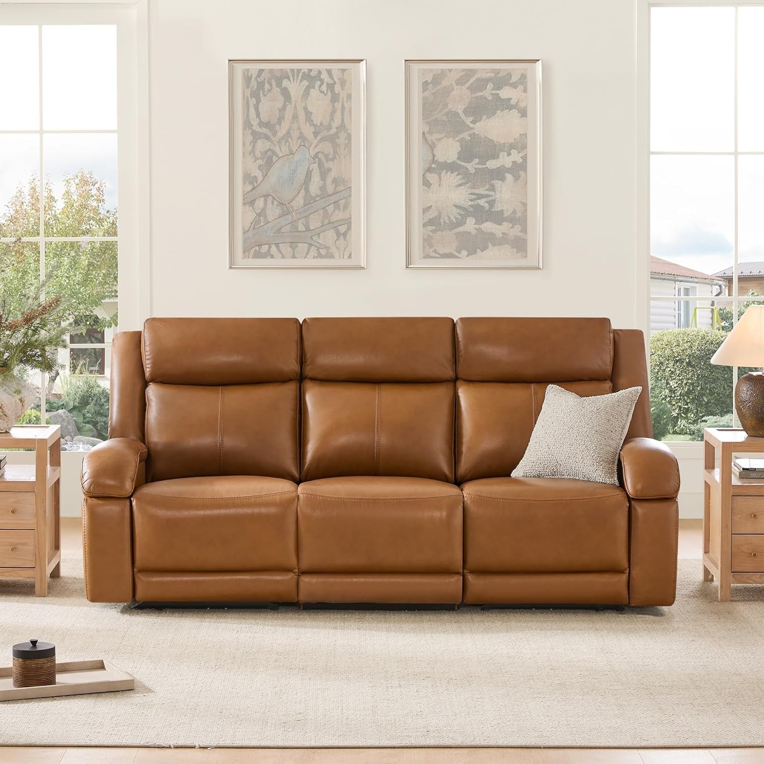 Brown leather sofa in a living room with decor elements.