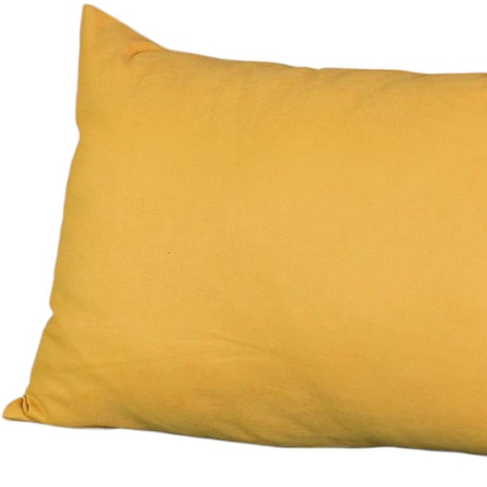 Yellow pillow on a white background