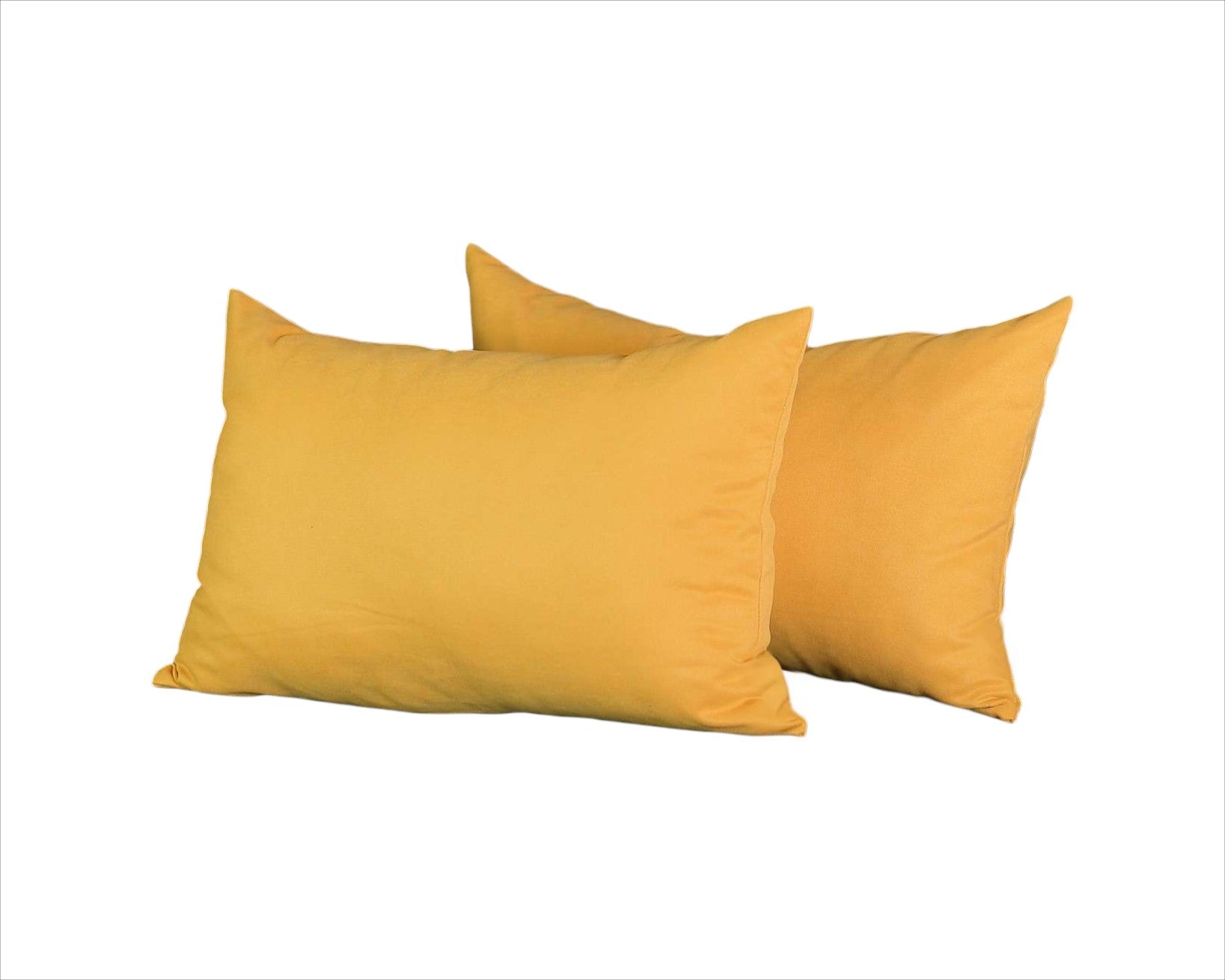 Two yellow pillows on a white background
