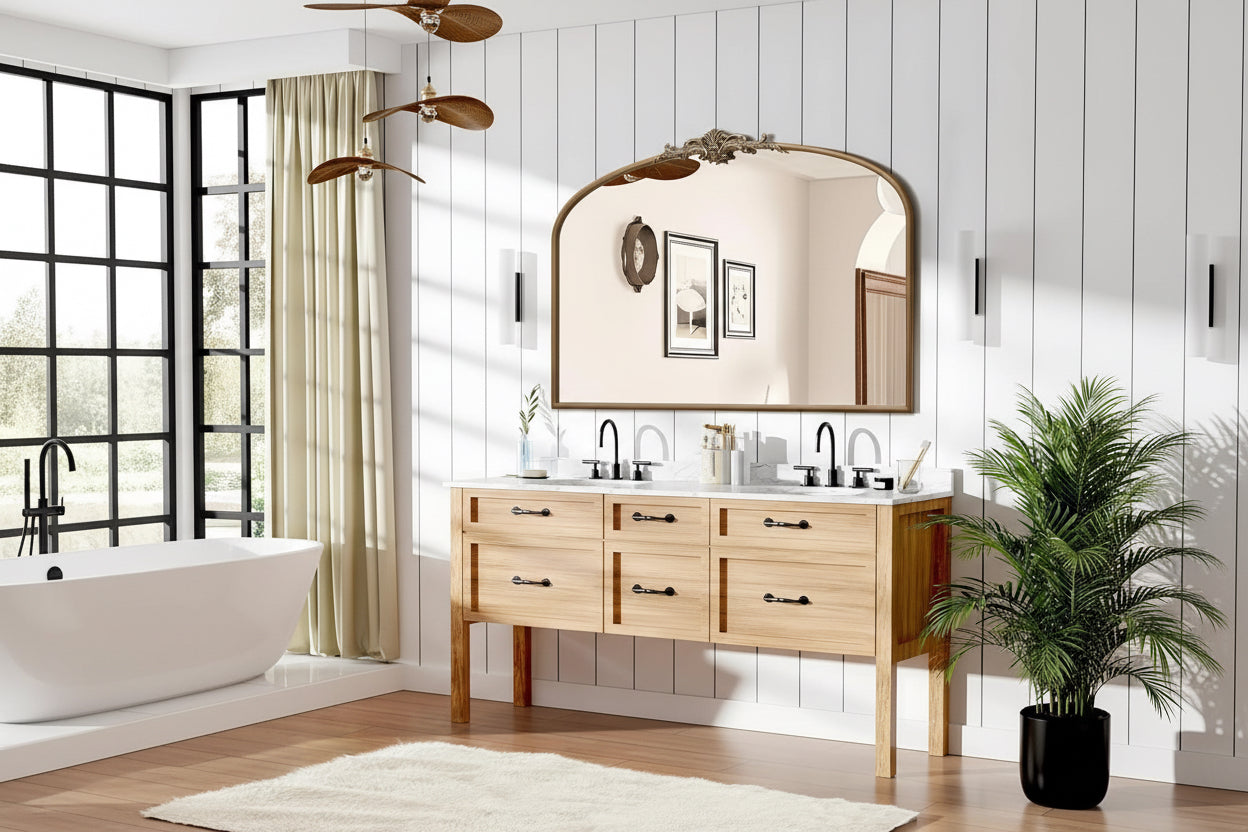 Woman applying makeup in a bathroom with a wooden vanity and decorative mirror.