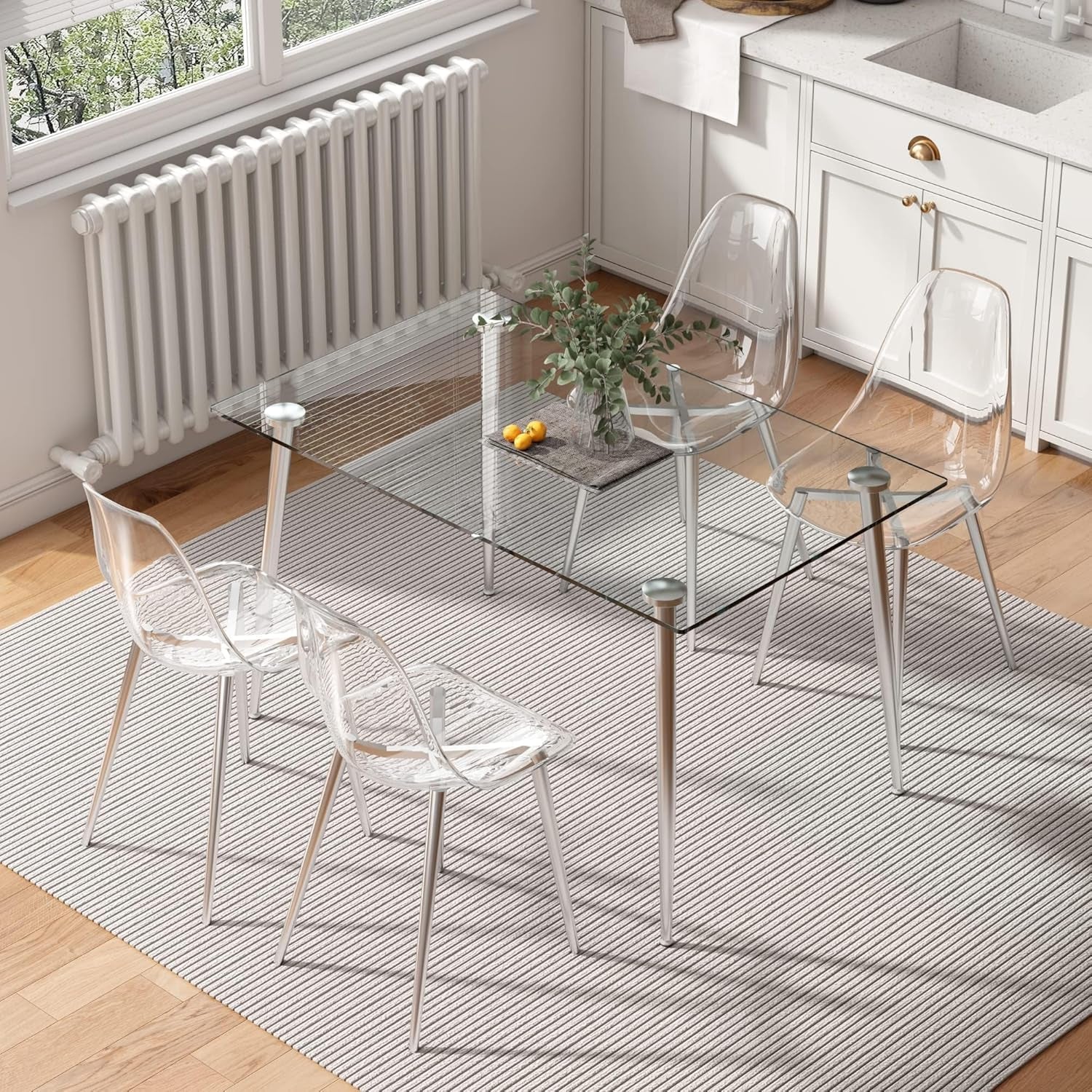 Clear glass dining table with transparent chairs in a modern kitchen.