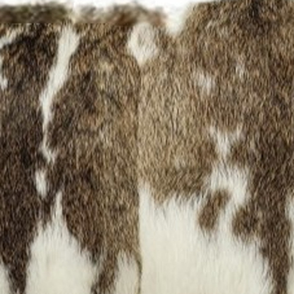 Close-up of a cowhide rug with brown and white pattern