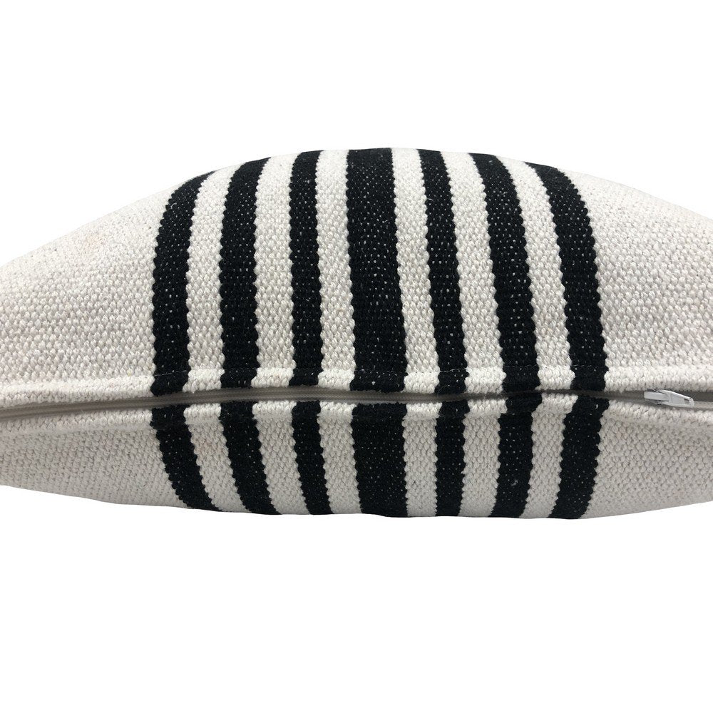 Close-up of a sneaker with black and white stripes on a white background