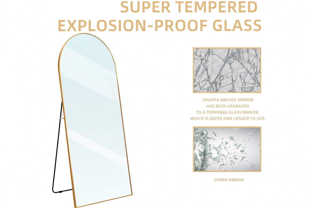 Baby holding a toy in front of a standing mirror with text about tempered glass.