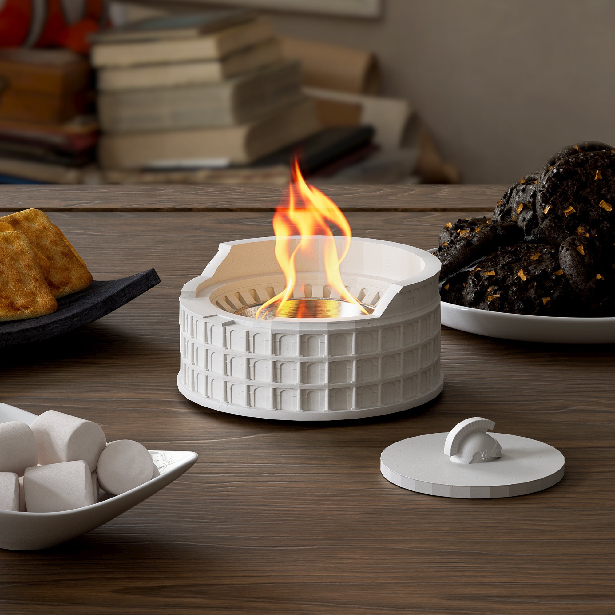 Small round fireplace with flames on a wooden table with food items around