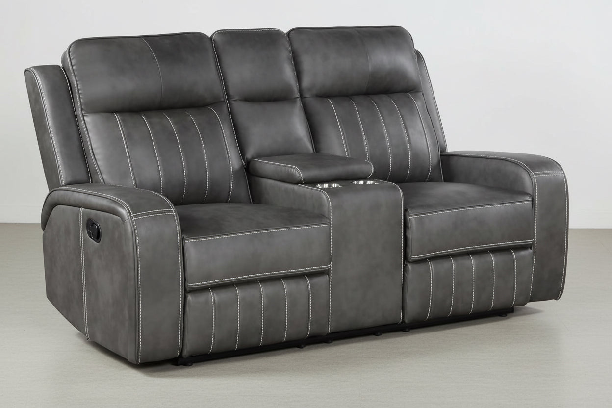 Gray reclining sofa with cup holders on a white background