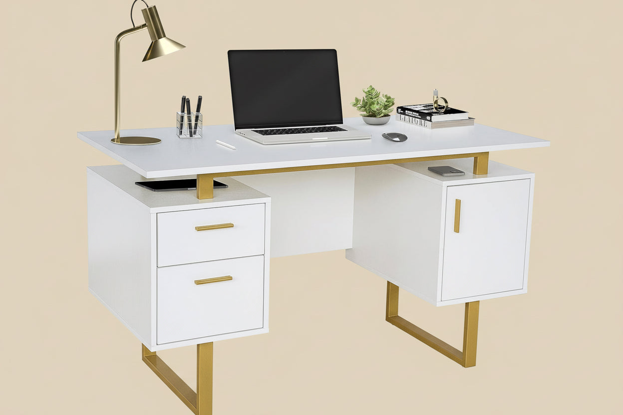 White office desk with gold legs and drawers, featuring a laptop and lamp on a white background.