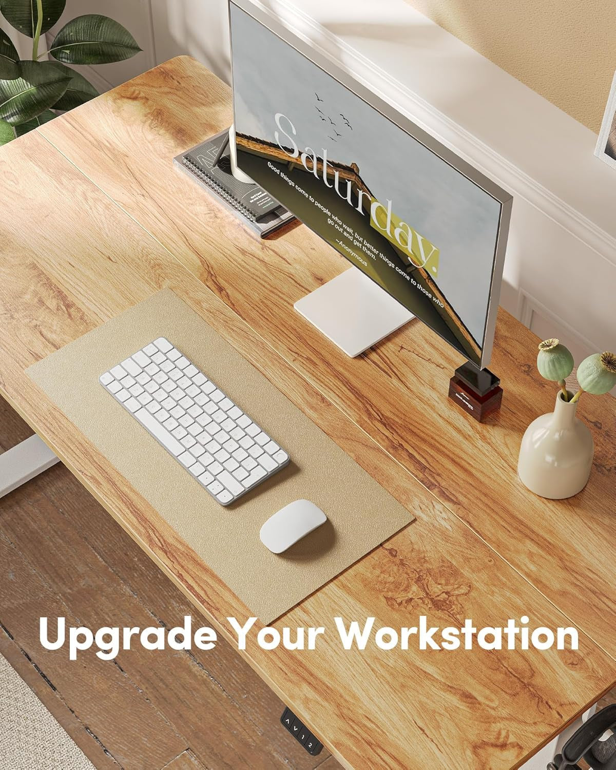 Wooden desk with computer setup and text 'Upgrade Your Workstation'.