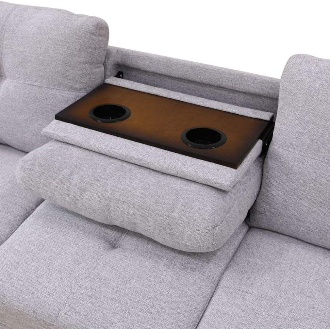 ray sectional sofa with ottoman in a living room setting.