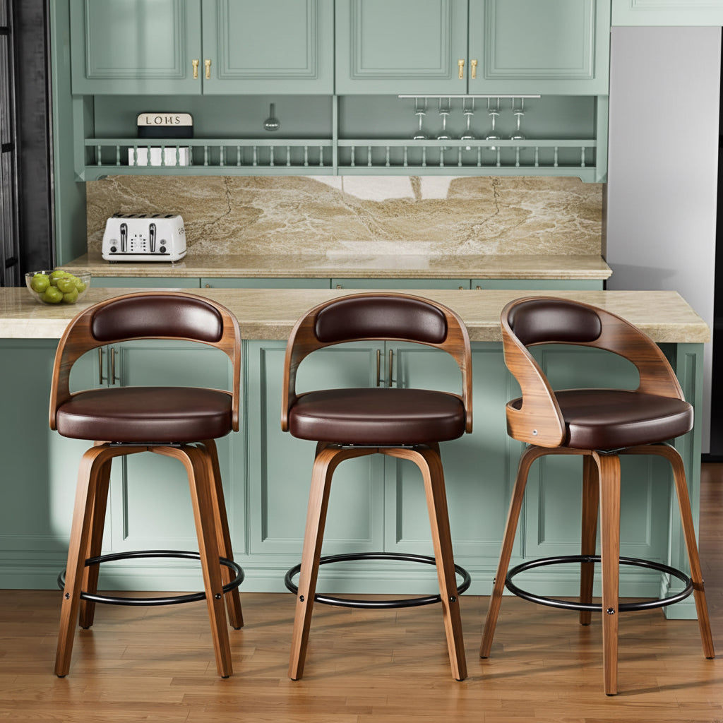 Two people in a kitchen with three wooden bar stools featuring brown leather seats.