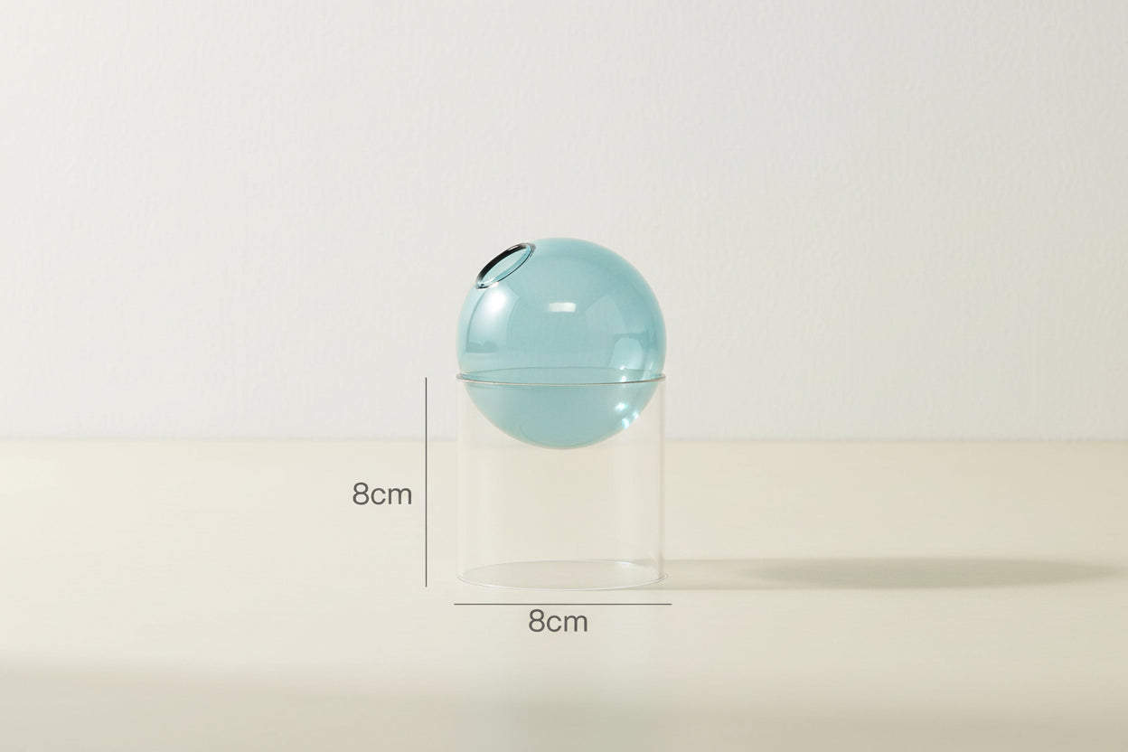 Light blue spherical object with dimensions labeled on a white background