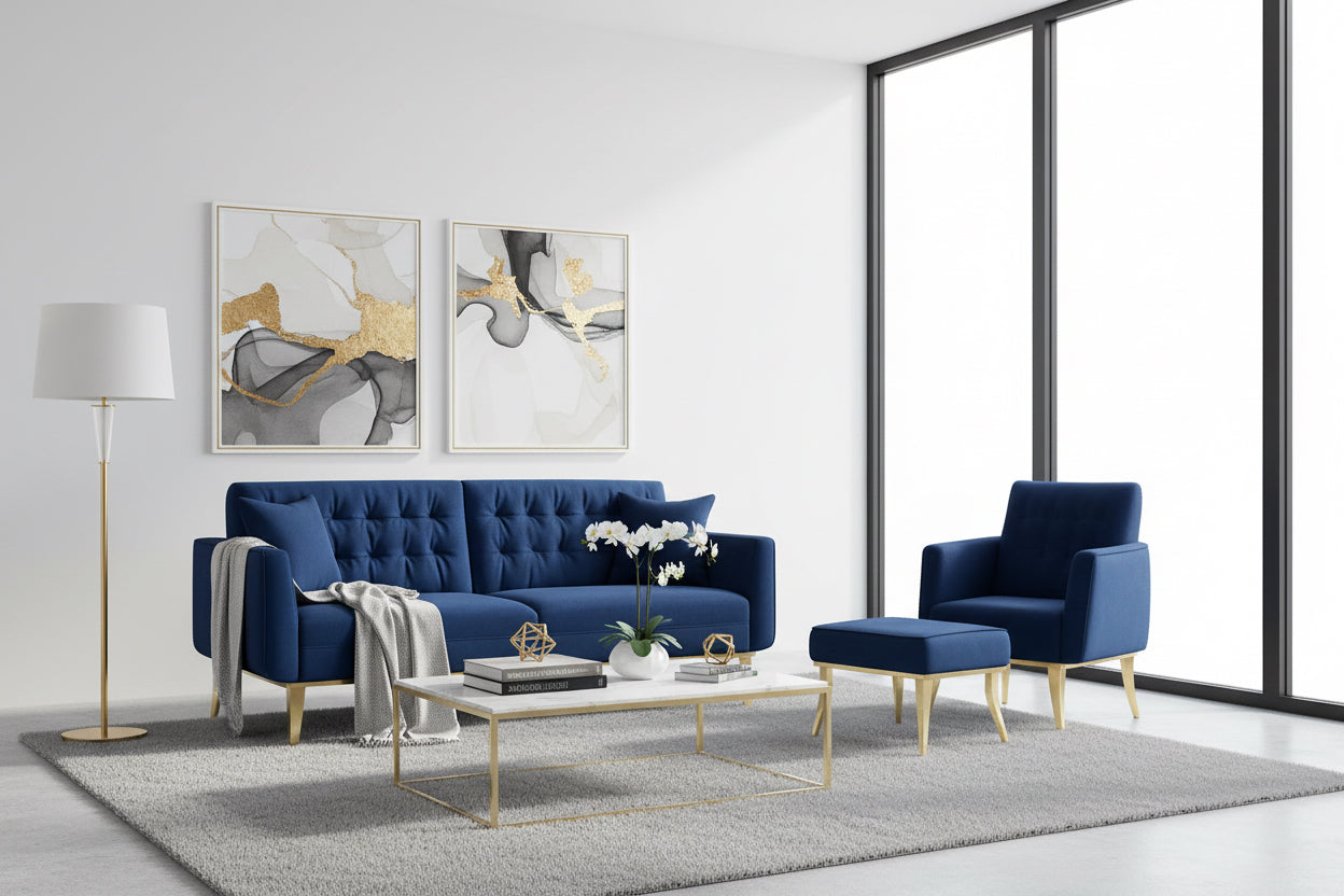 Blue sofa set with matching armchair and ottoman against a beige wall.