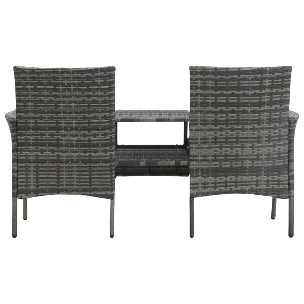 Two dark gray wicker chairs with a matching table on a white background