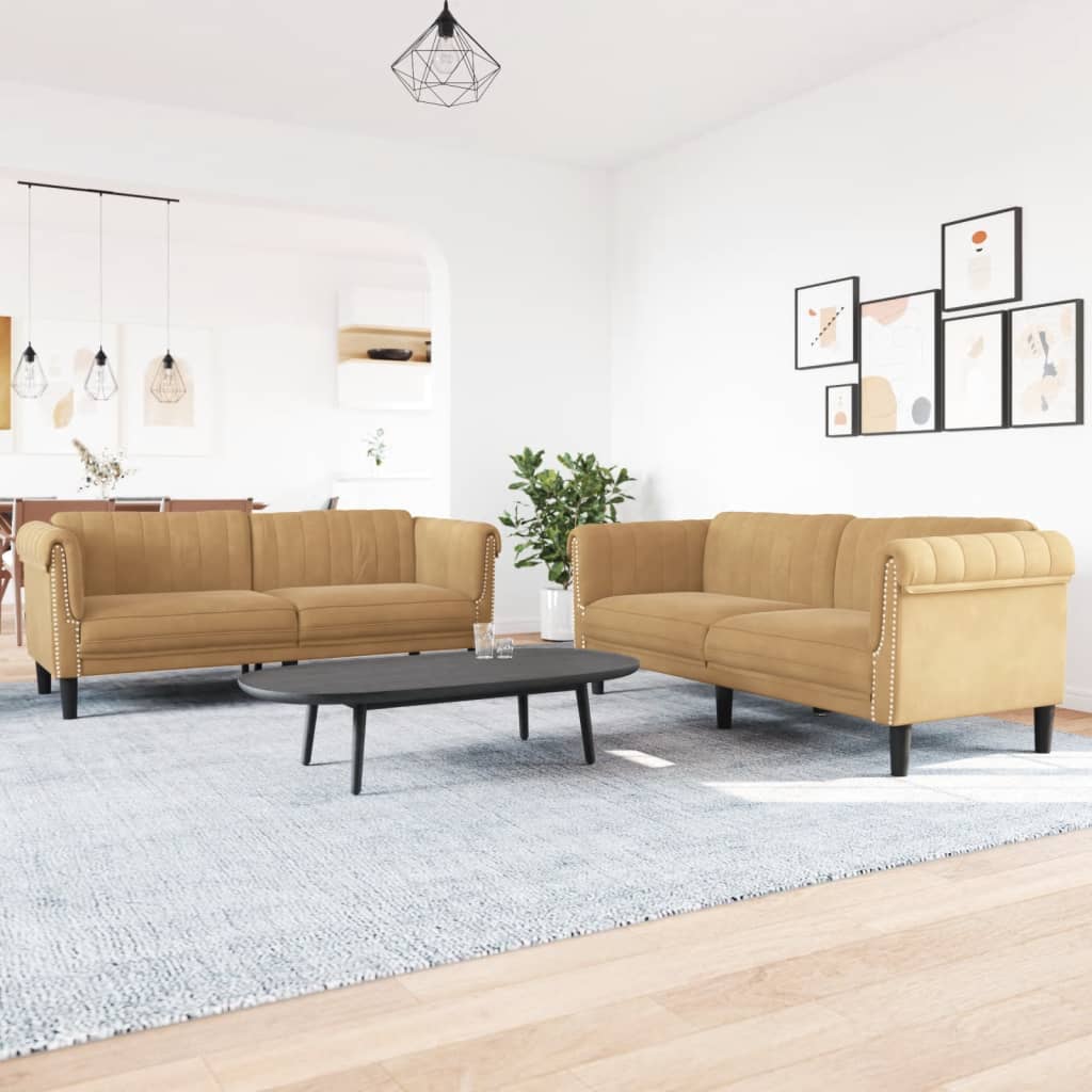 Beige sofa set in a modern living room with a coffee table and decor elements.
