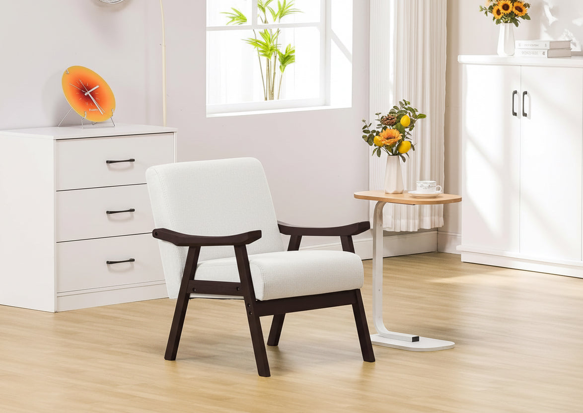 Woman sitting on a small wooden chair in a room with a table and plants.