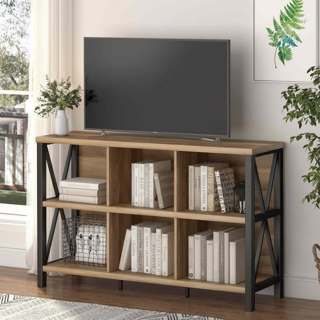 Wooden TV stand with shelves displaying decor items in a living room setting.