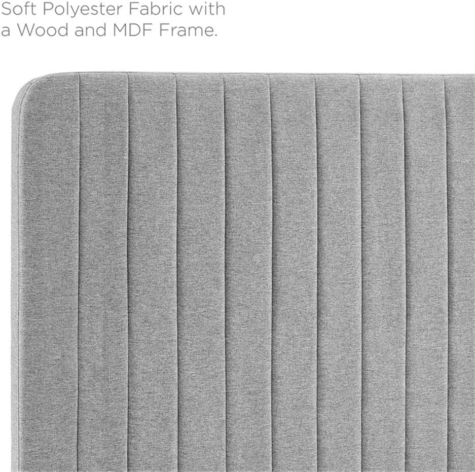 Gray upholstered headboard with soft polyester fabric and wood or MDF frame.