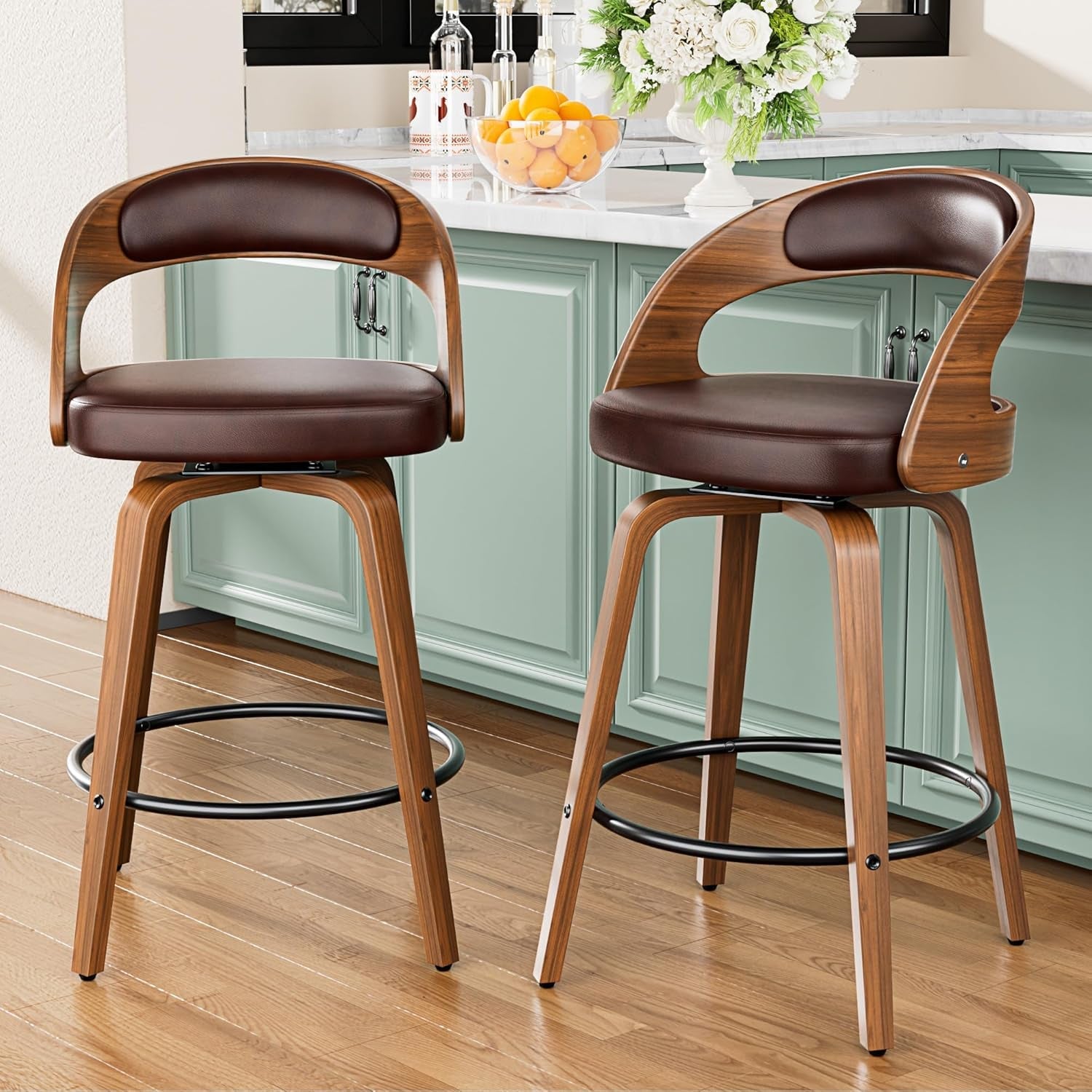 Two brown bar stools with wooden legs in a kitchen setting.