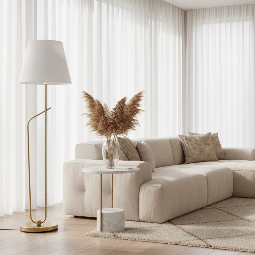 Modern floor lamp with white shade and gold base