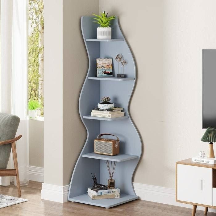 Wavy bookshelf with decorative items in a room setting