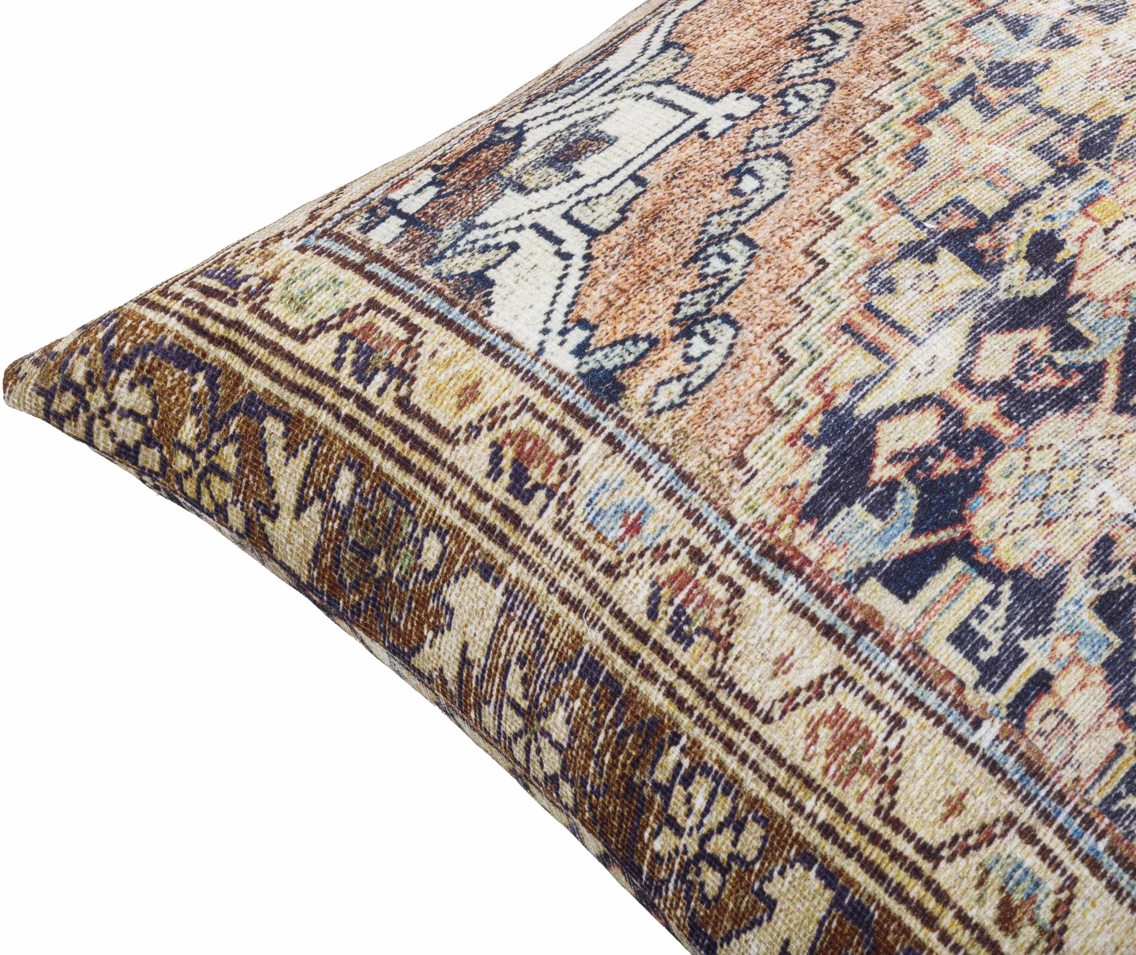 Close-up of a patterned rug with intricate designs on a white background