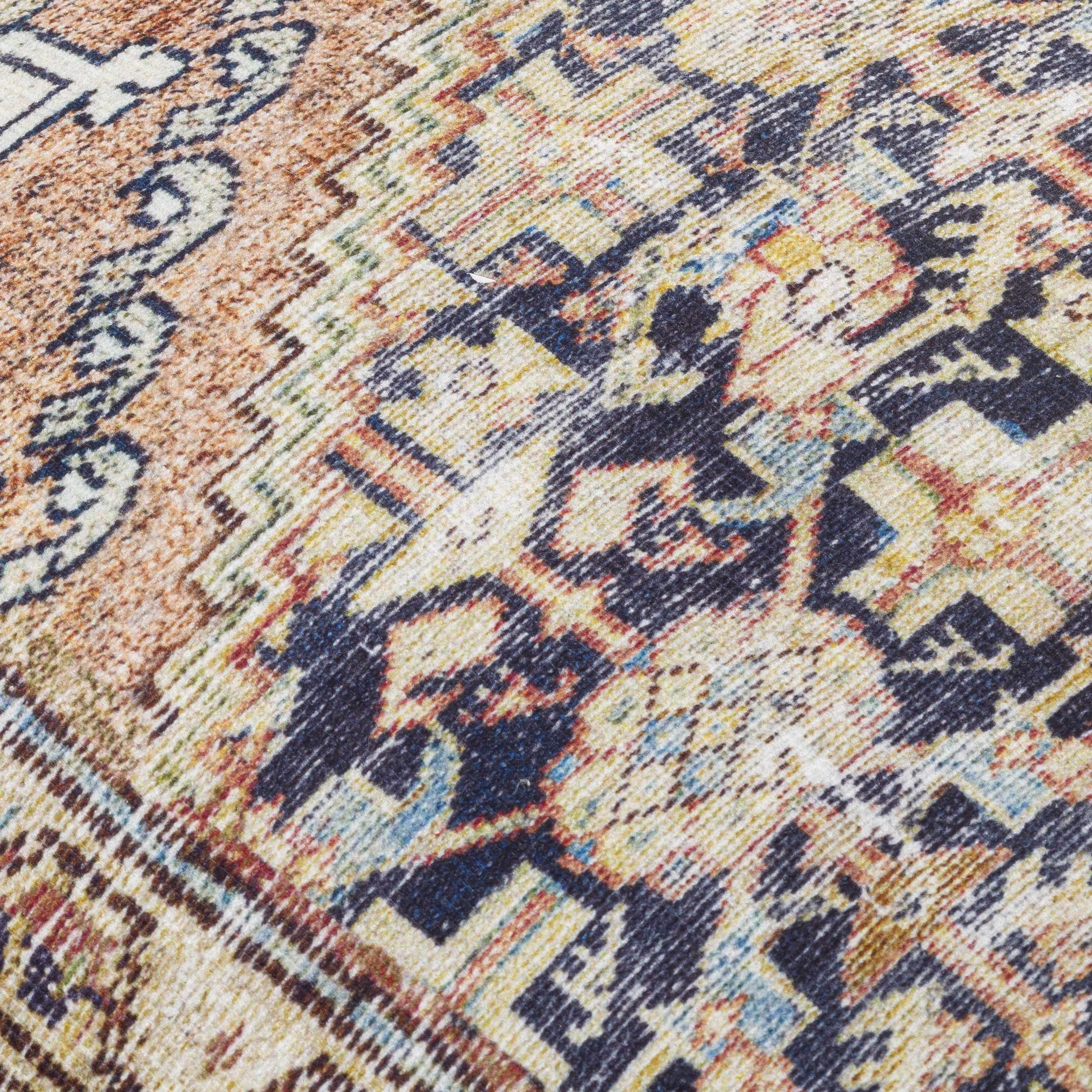 Close-up of a patterned rug with intricate designs.