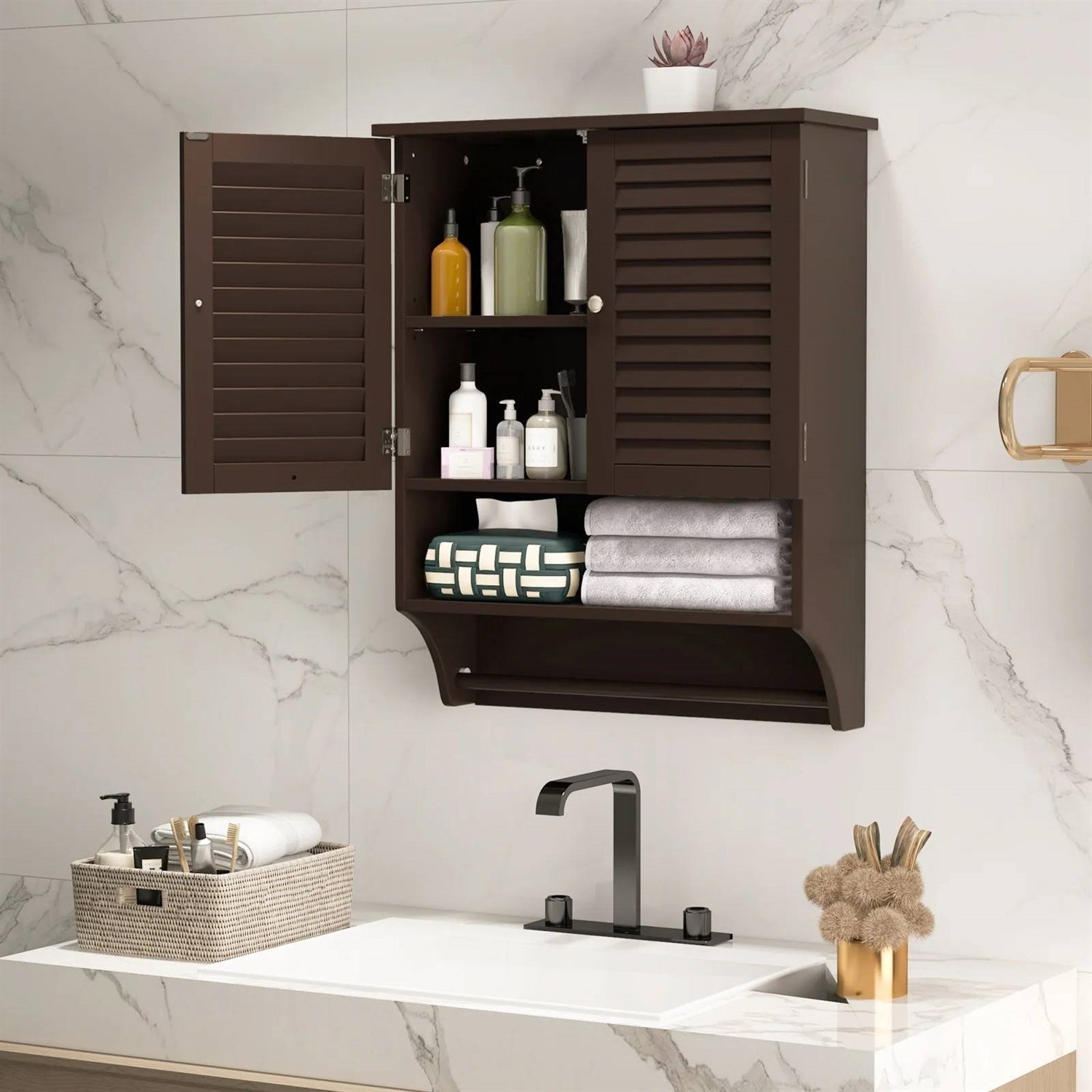 Wall-mounted cabinet with open doors displaying toiletries and towels in a bathroom setting.