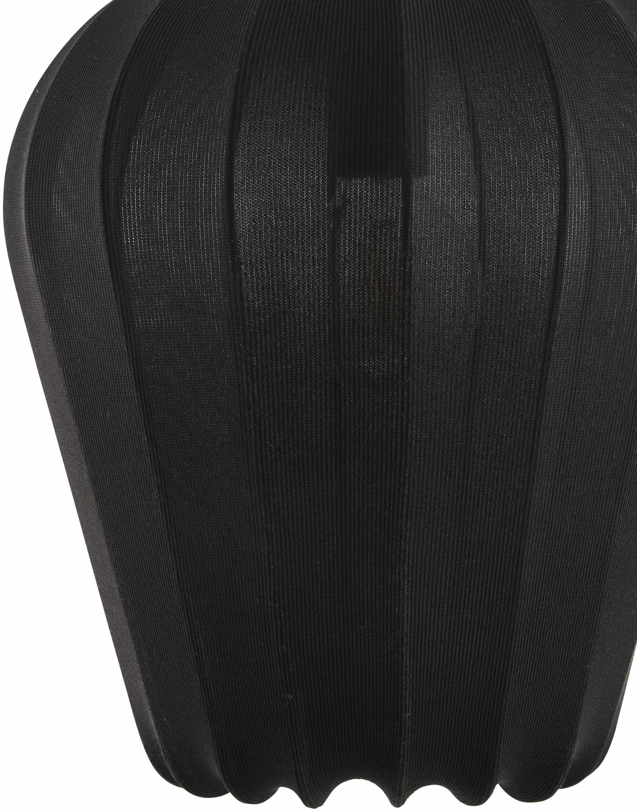 Black leather seat cover on a white background