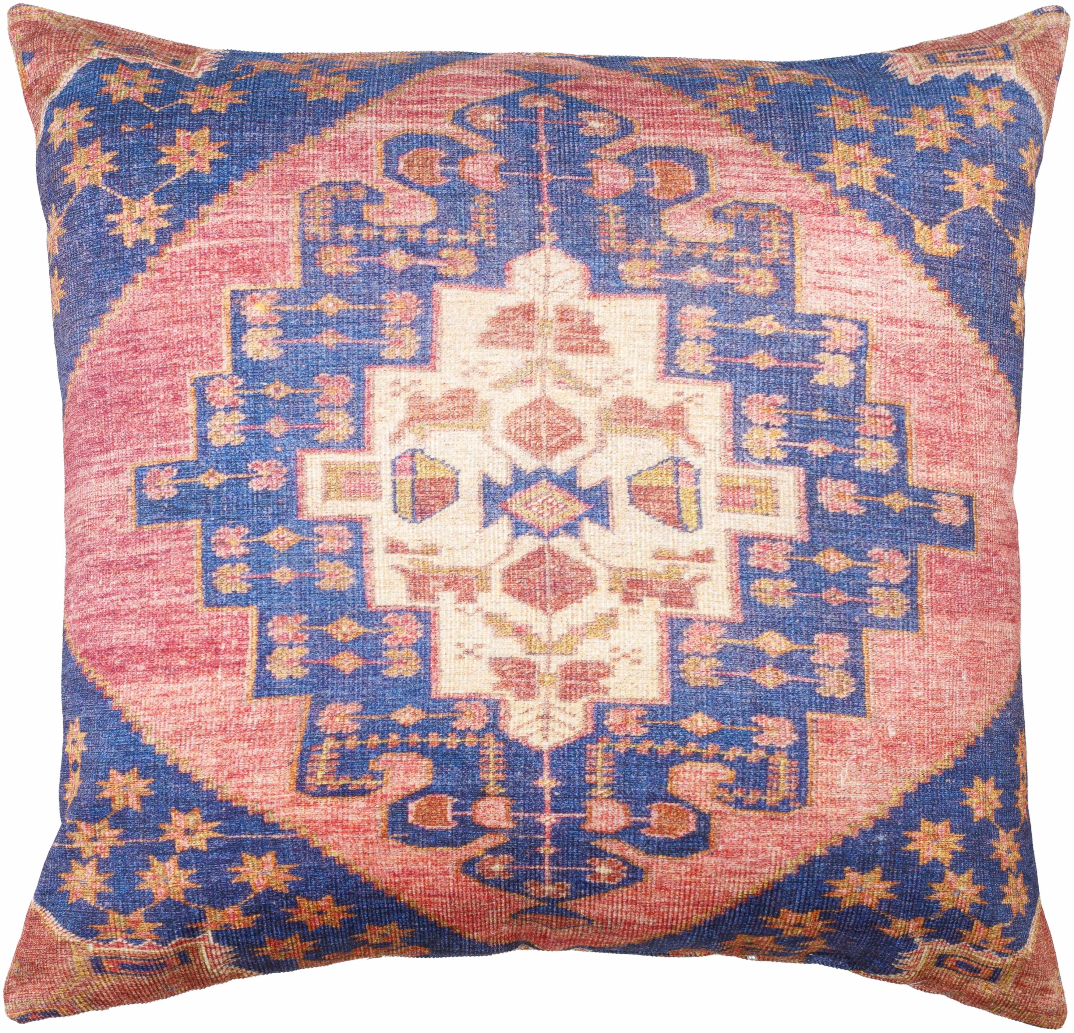 Decorative pillow with intricate geometric pattern on a blue and pink background