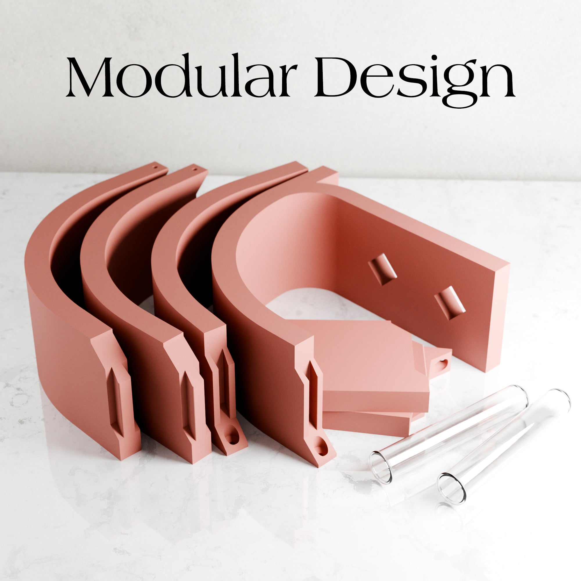 Set of pink modular design components on a white surface with 'Modular Design' text above.
