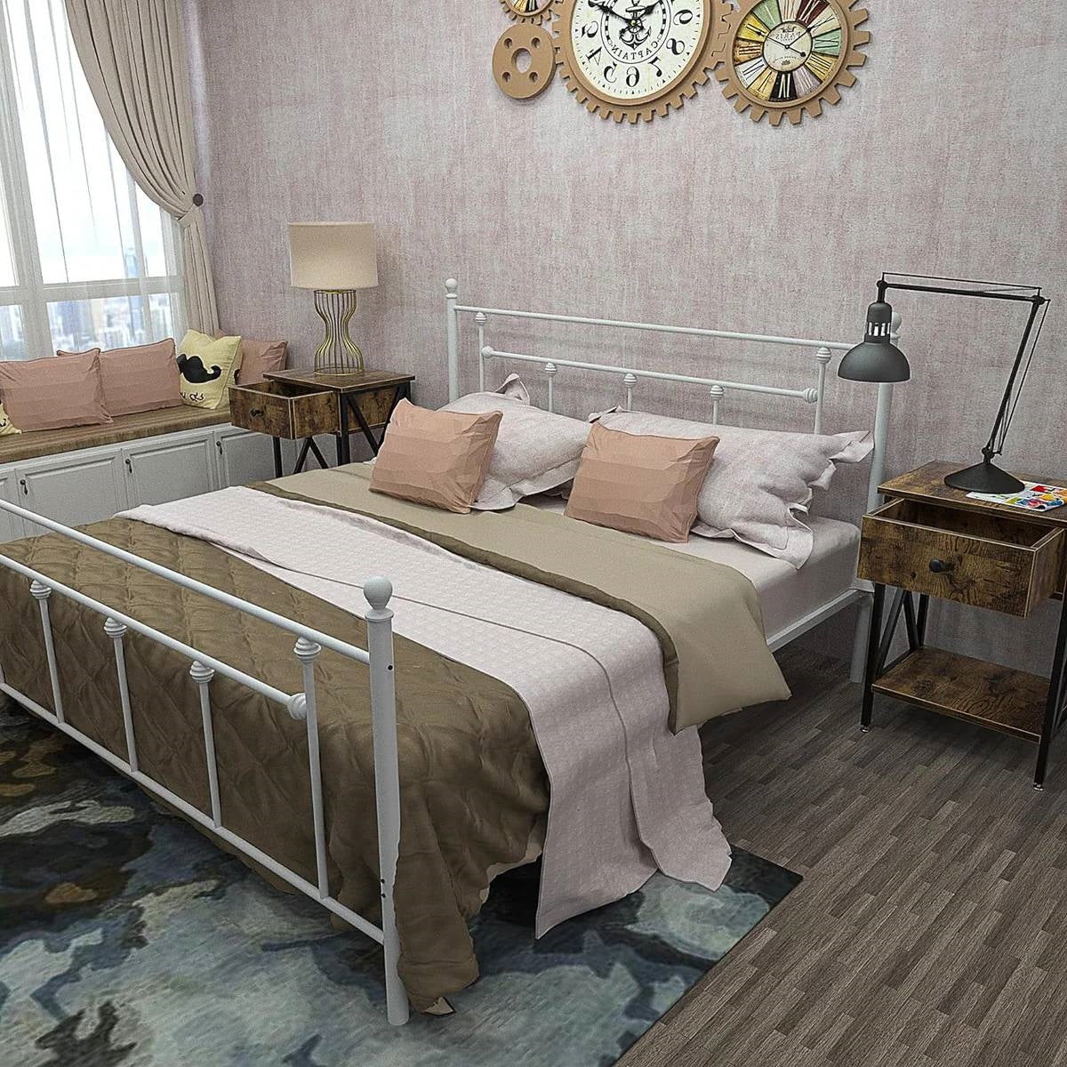 Bedroom with a white metal bed, beige bedding, and decorative pillows.