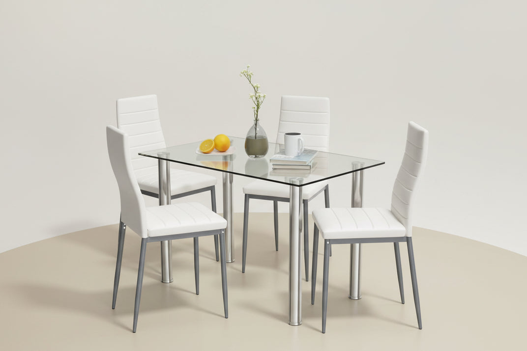 Dining table set with four white chairs on a white background