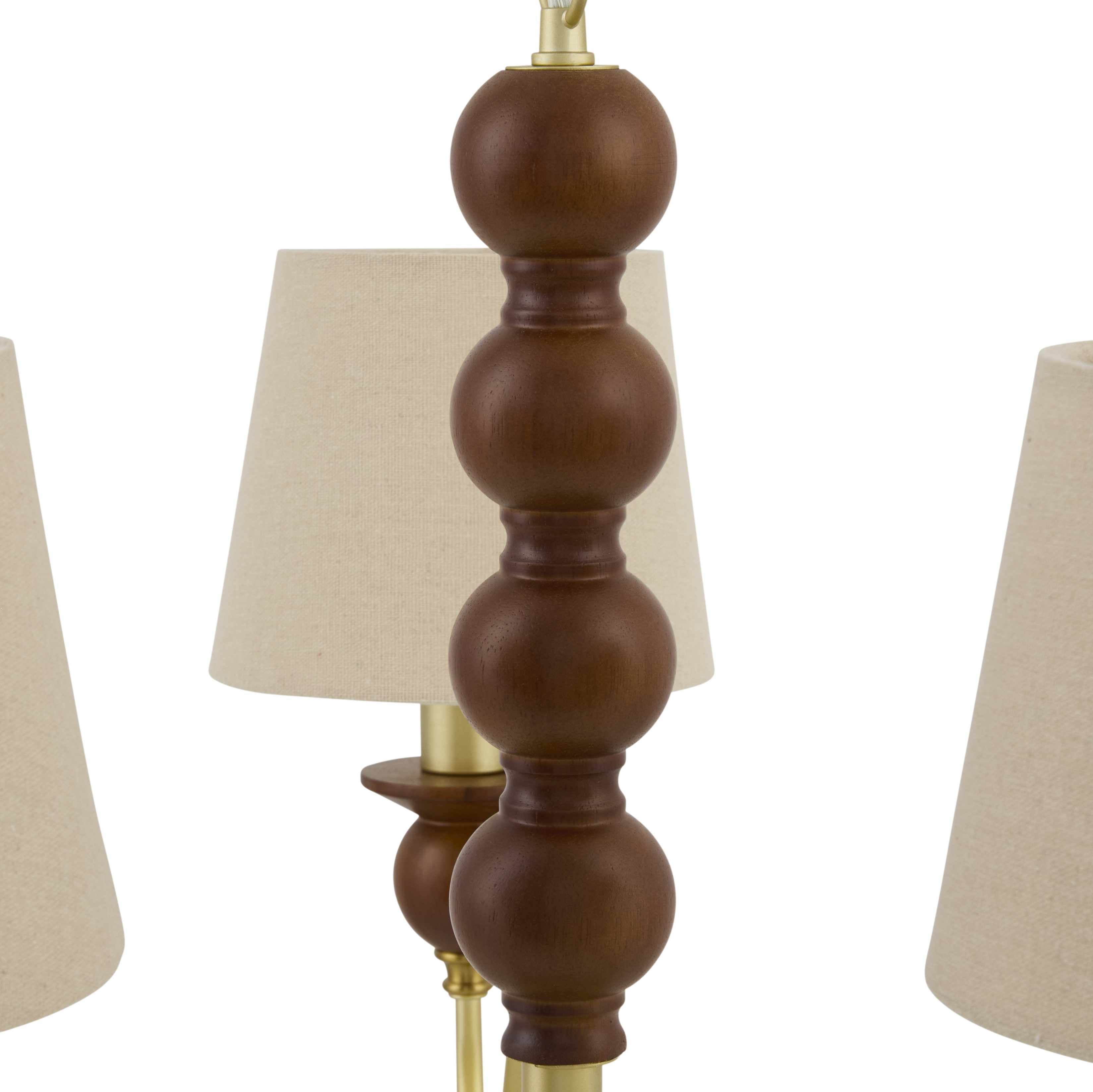 Wooden lamp with beige lampshade on a white background