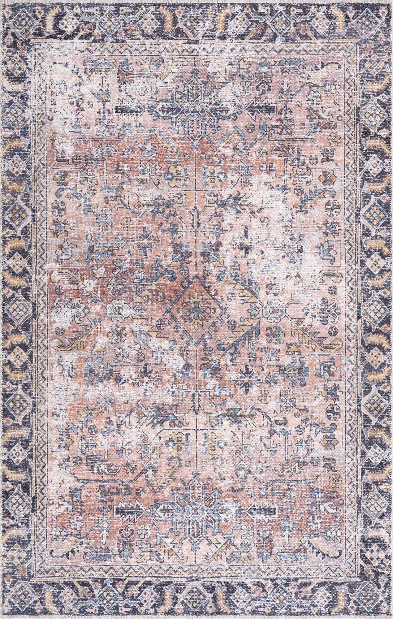 Patterned rug with a mix of colors on a plain background