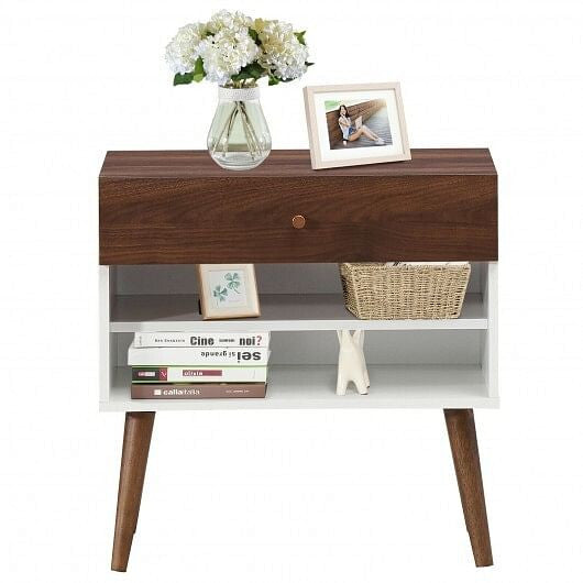Wooden side table with a drawer, books, a vase with flowers, and a photo frame on a white background