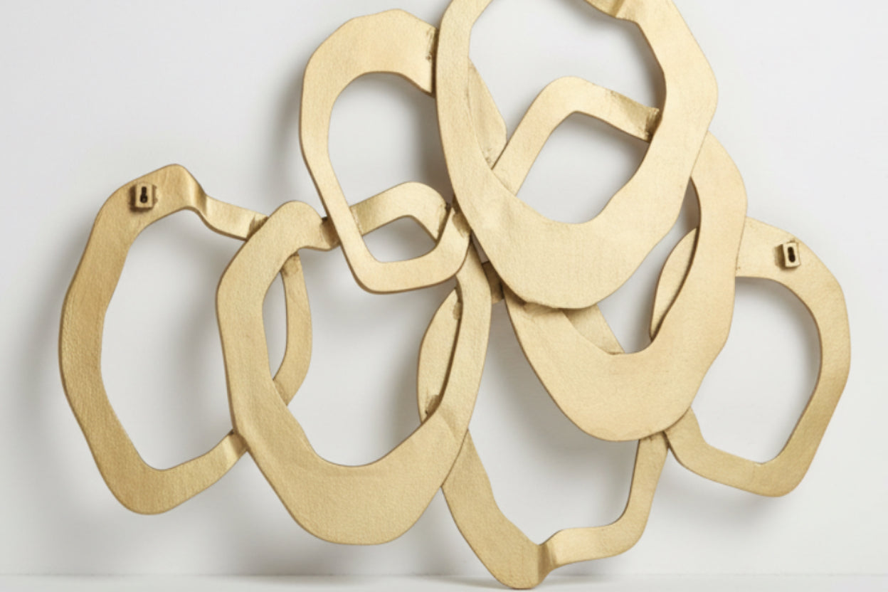 Gold hoop earrings on a white background