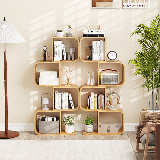 Wooden bookshelf with decorative items in a living room setting