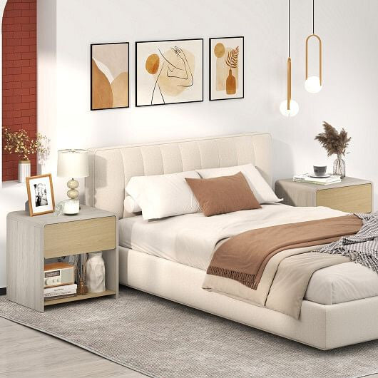 Neatly arranged bedroom with a bed, nightstands, and wall art.