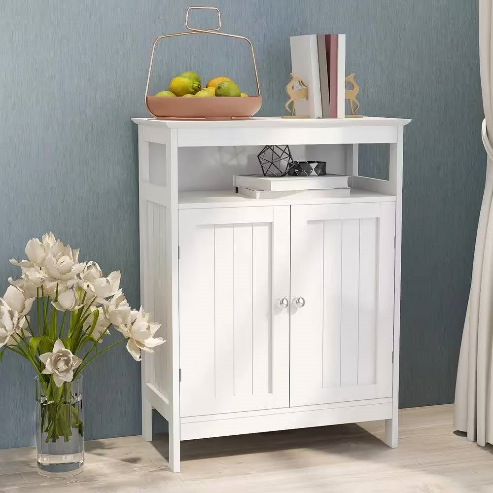 White cabinet with decorative items against a blue wall