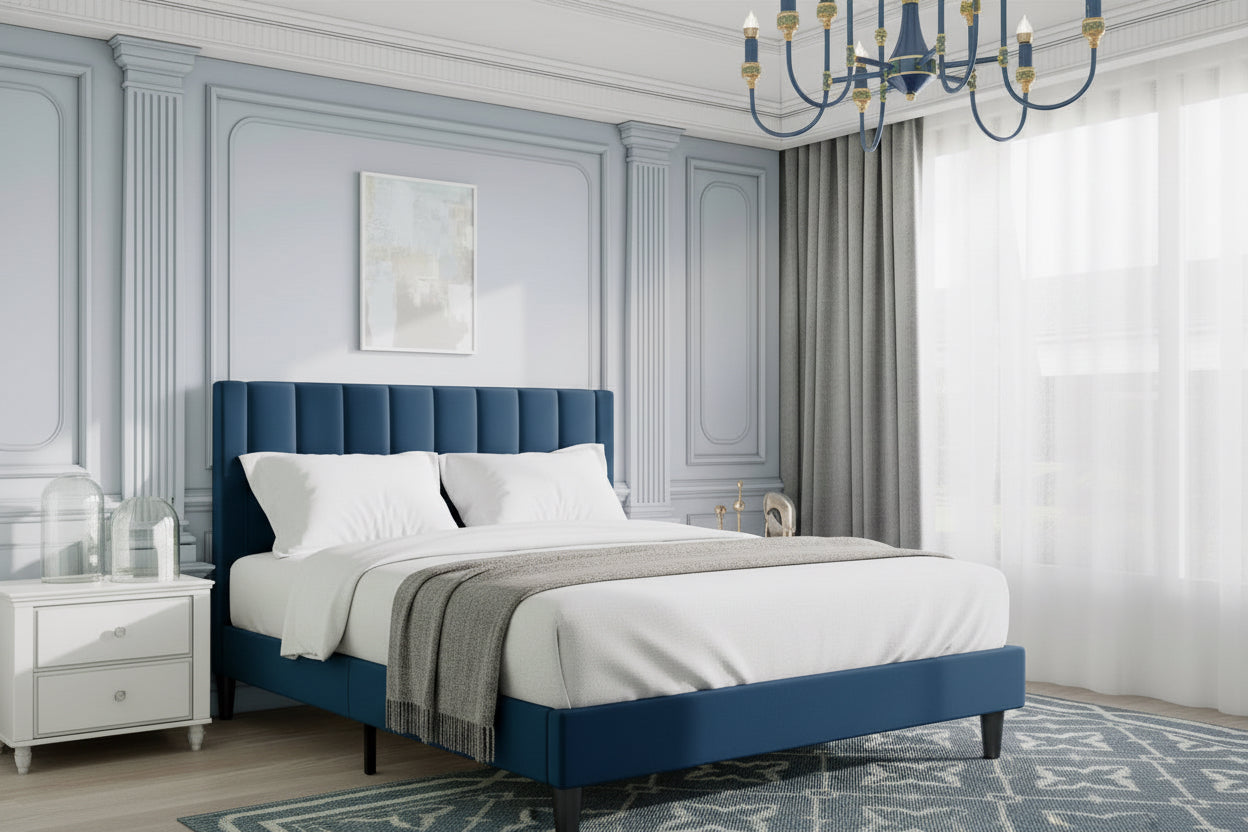 Modern bedroom with a blue upholstered bed and decorative rug.